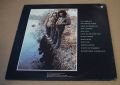 Orphan-Rock And Reflection